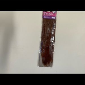 Hair braiding piece. Brown In colour. Brand Darling